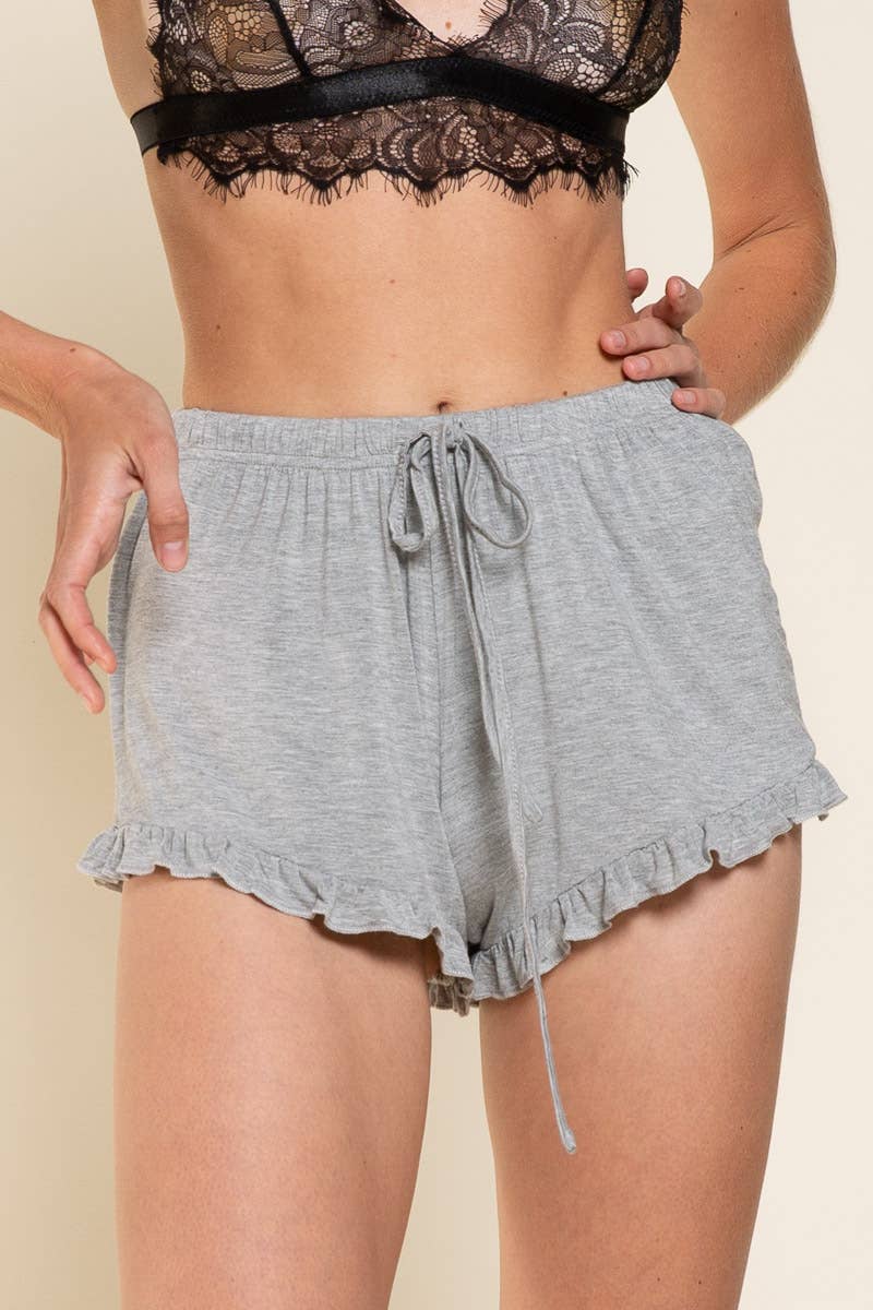 Elastic drawstring waist ruffle trim dolphin shorts