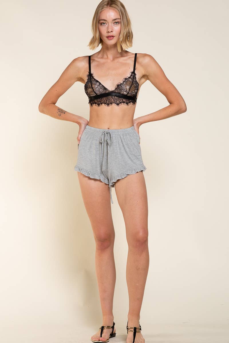 Elastic drawstring waist ruffle trim dolphin shorts