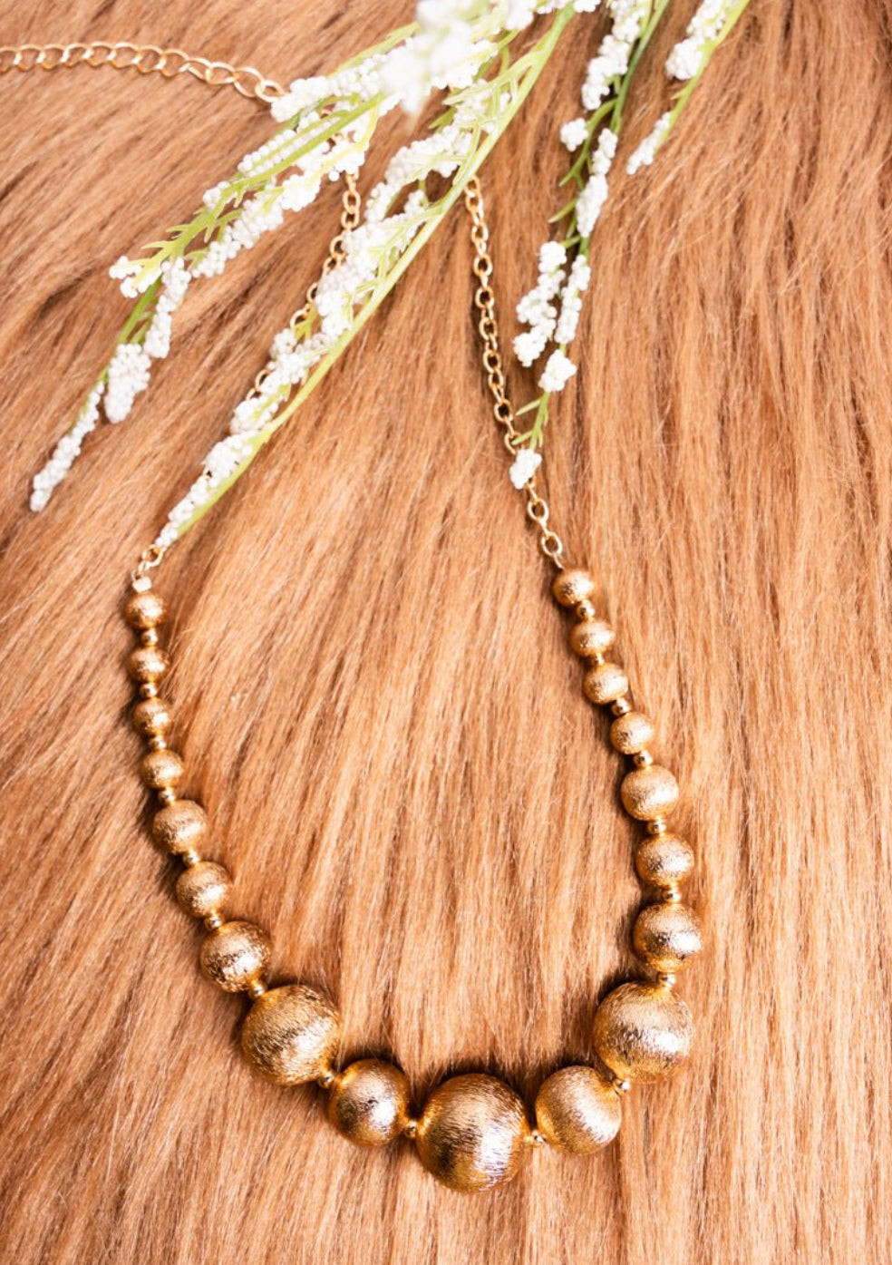 Emberly goldtone bead necklace